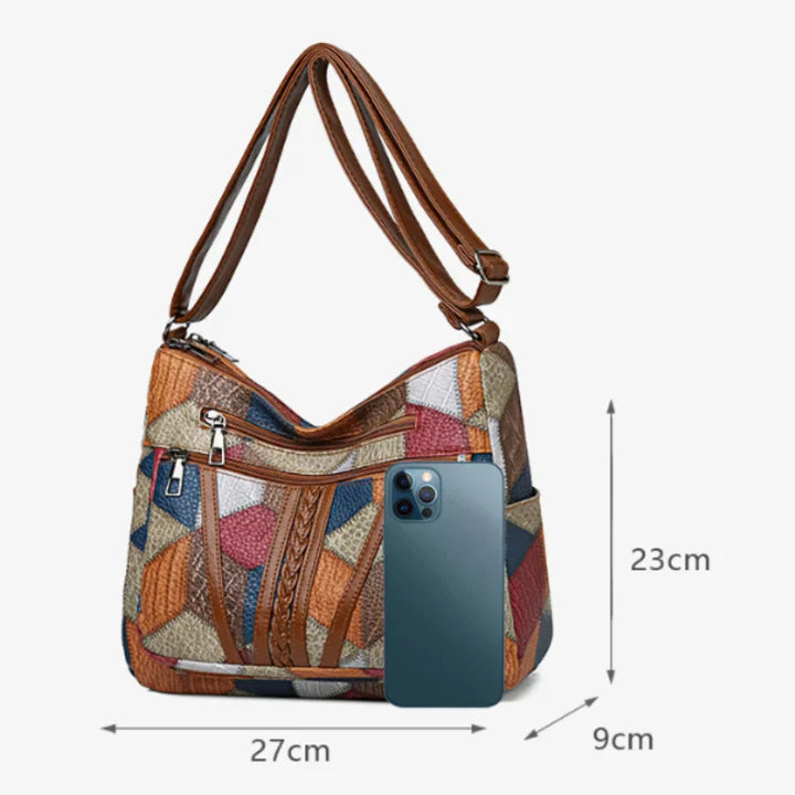 Bolso de mano de piel con mosaico